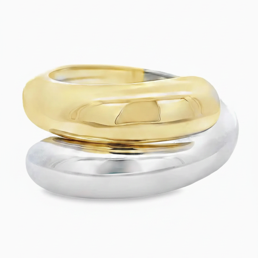 Two-toned gold and silver ring on a white background