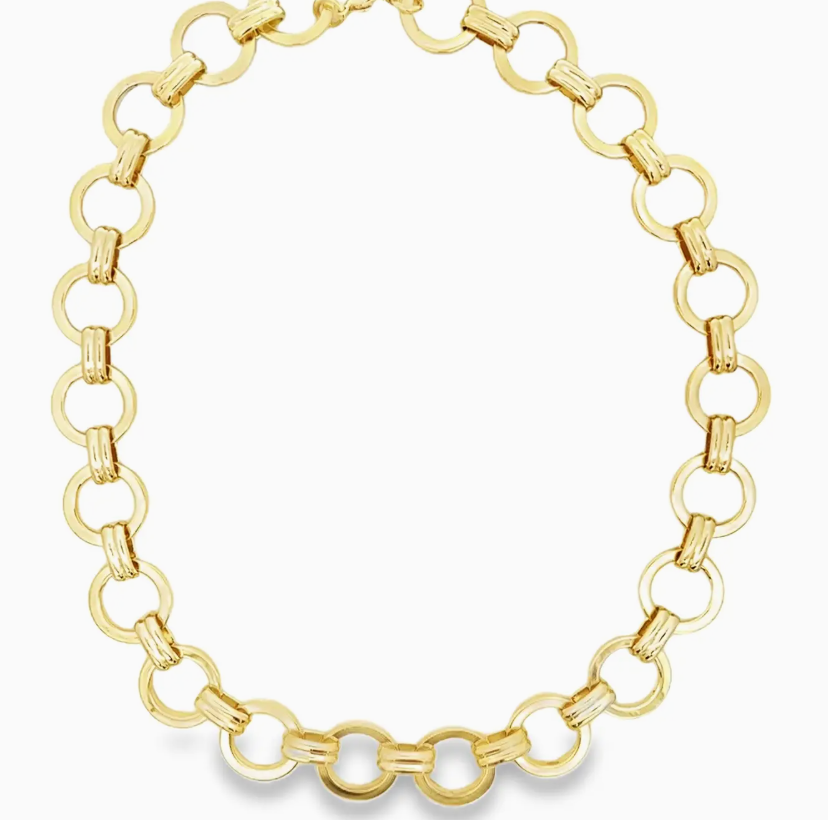 Gold chain necklace on a white background